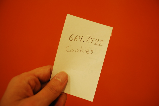 (a slip of paper with '664.7522 Cookies' written on it)